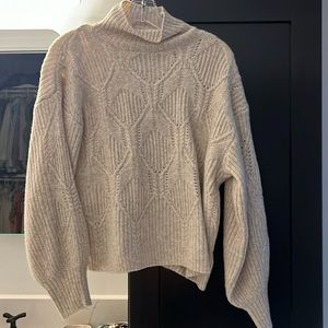 Super soft sweater. Not too heavy. Nice neckline